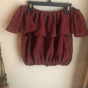 Red/burnt orange off the shoulder top